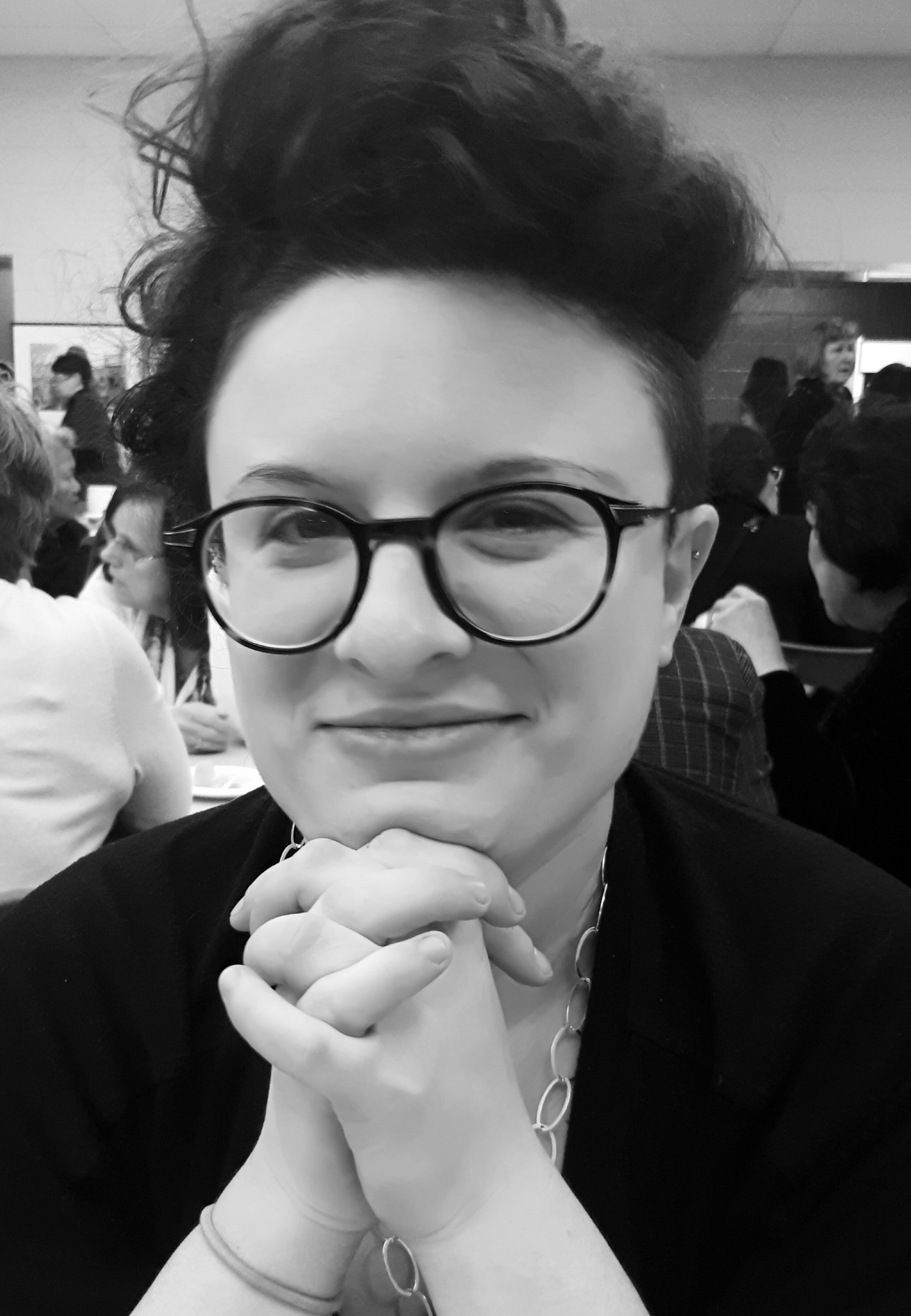 ELISE E.