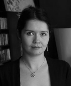 LAURA T.